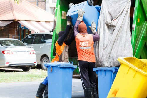 Inspector reviewing waste transfer documents during investigation