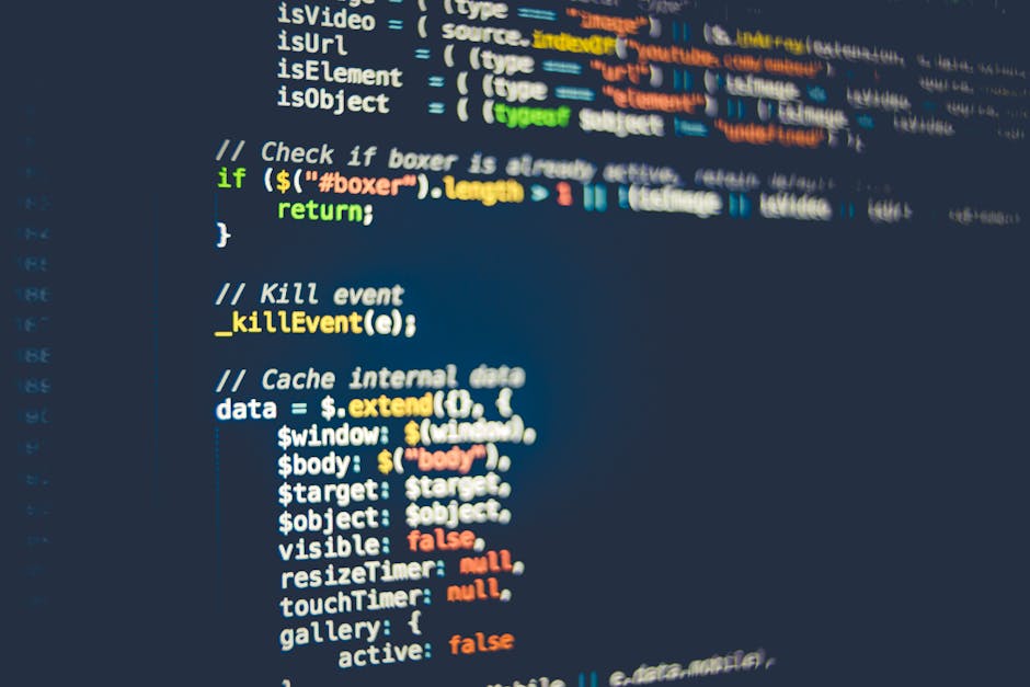 The image displays a close-up view of a computer screen showing lines of colorful programming code in a text editor or integrated development environment. The code includes various CSS styling propert